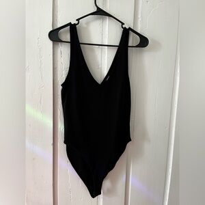 Forever 21 Black Bodysuit with Deep V-Neck and High-Cut Design
